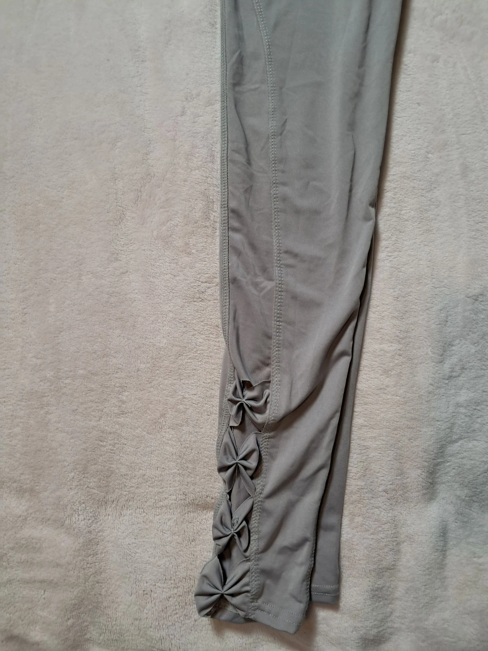 Legging collant avec petits nœuds.  Taille S/M